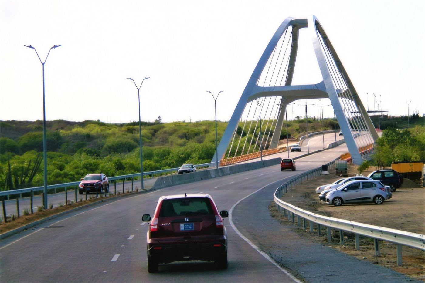 The Spanish Lagoon bridge on the coast road toward San Nicolas, Aruba, seen from a car